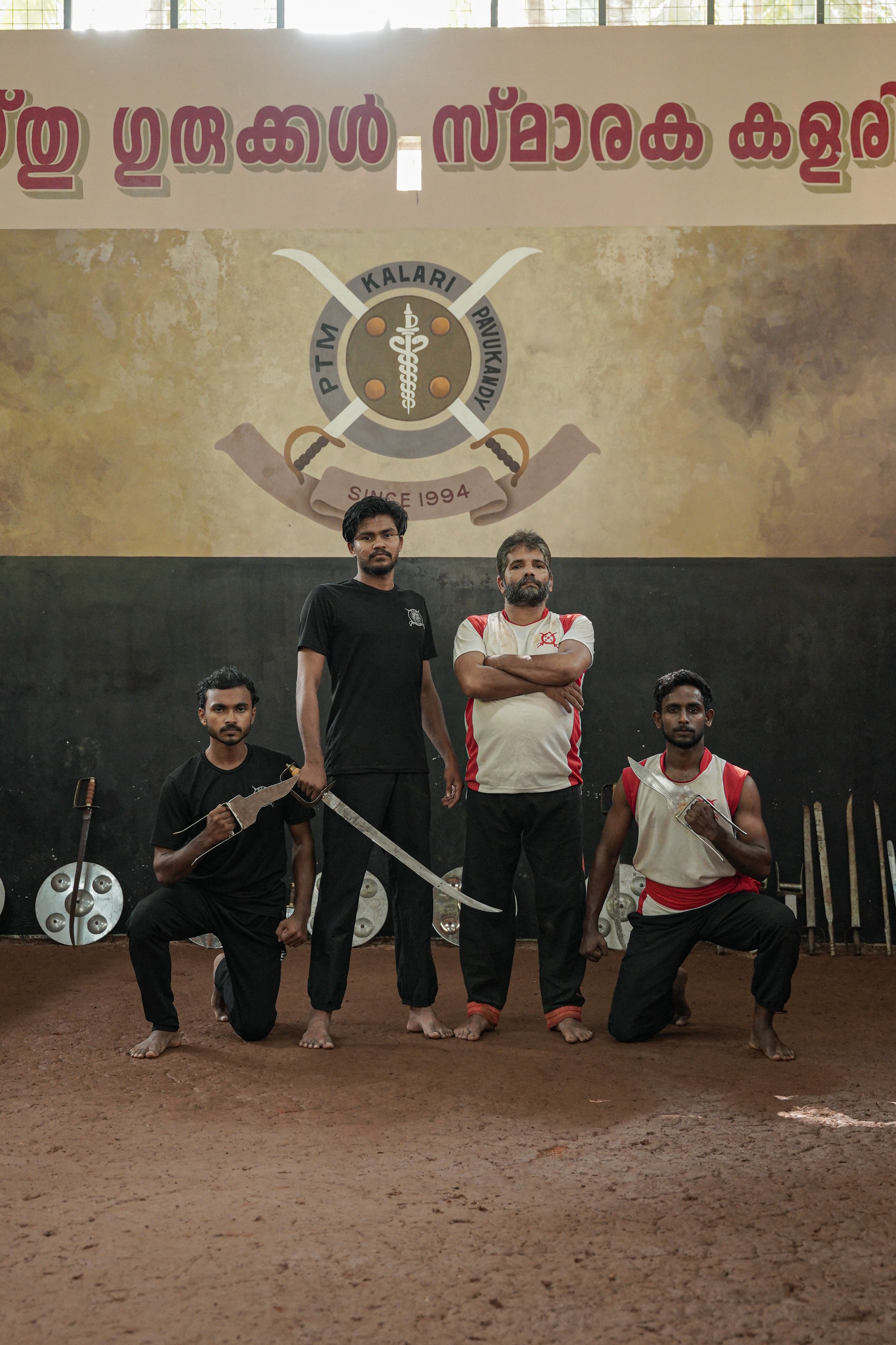 Kalarippayattu performers demonstrating synchronized movements